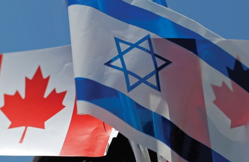 The flags of Israel and Canada (credit: REUTERS)